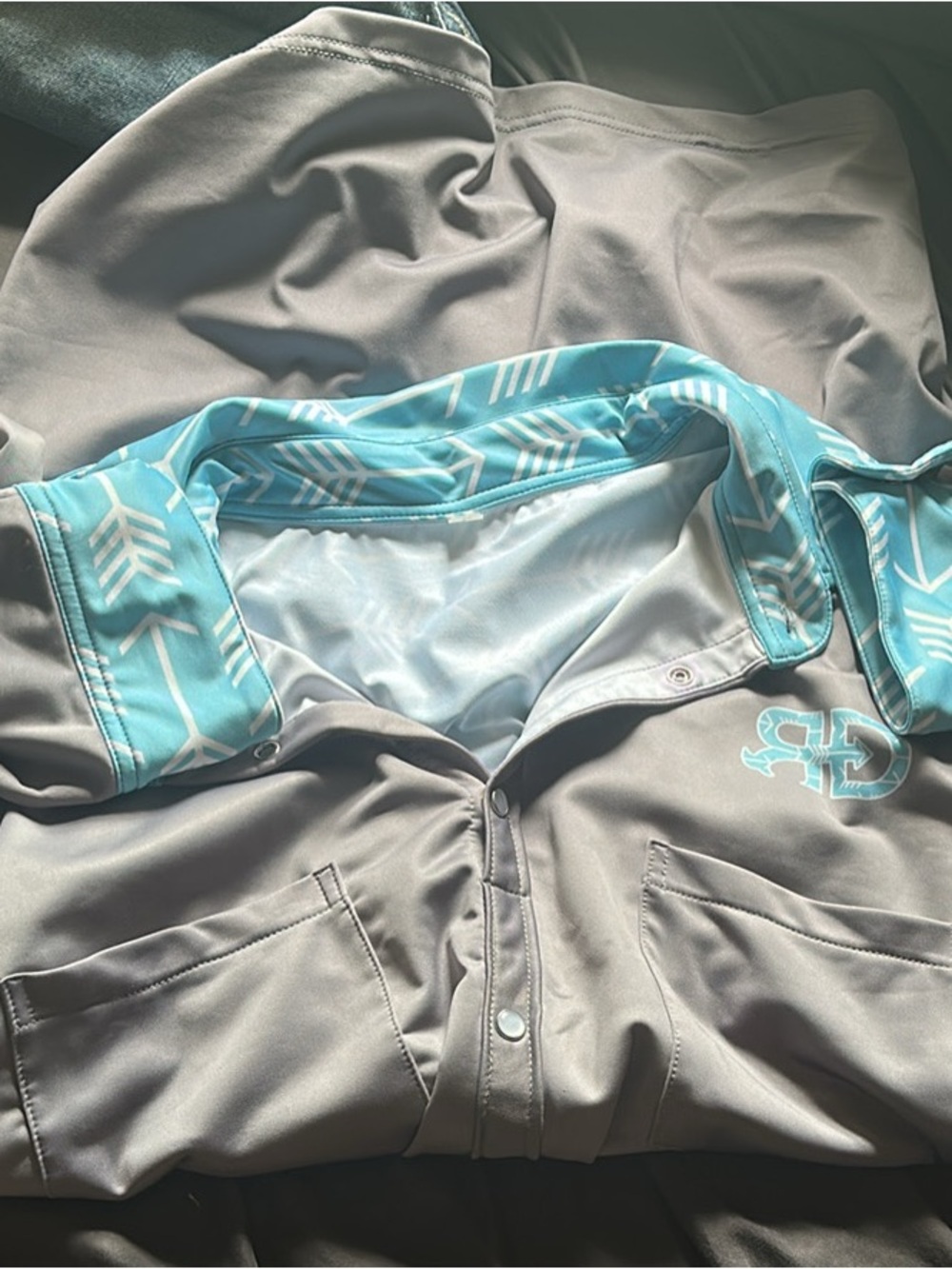 Rocket Donkey Gray Jacket with Aqua Arrow-Print Lining